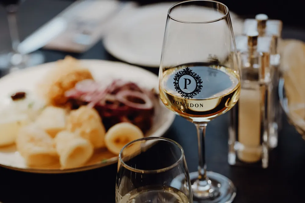Poseidon wine glass with Greek specialities
